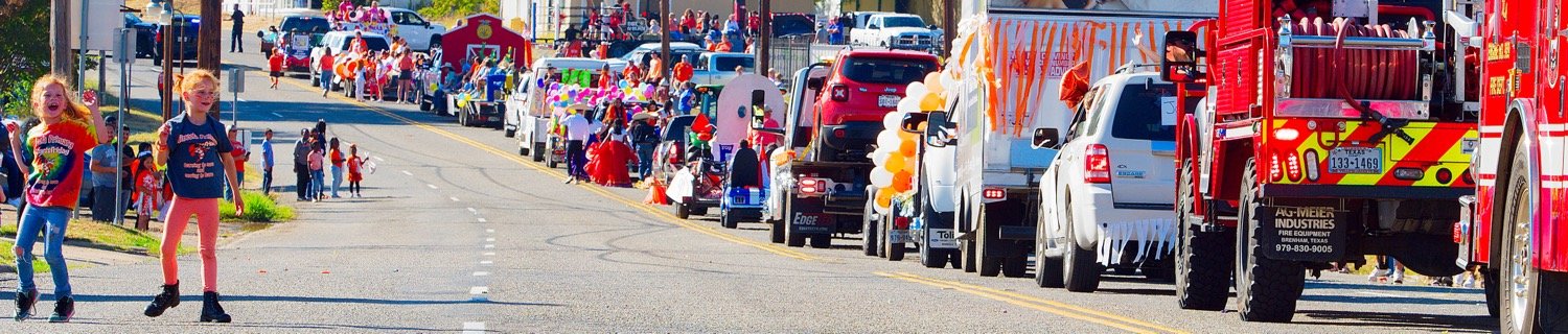 The Mineola homecoming parade nears its conclusion on W. Broad Street Friday afternoon.